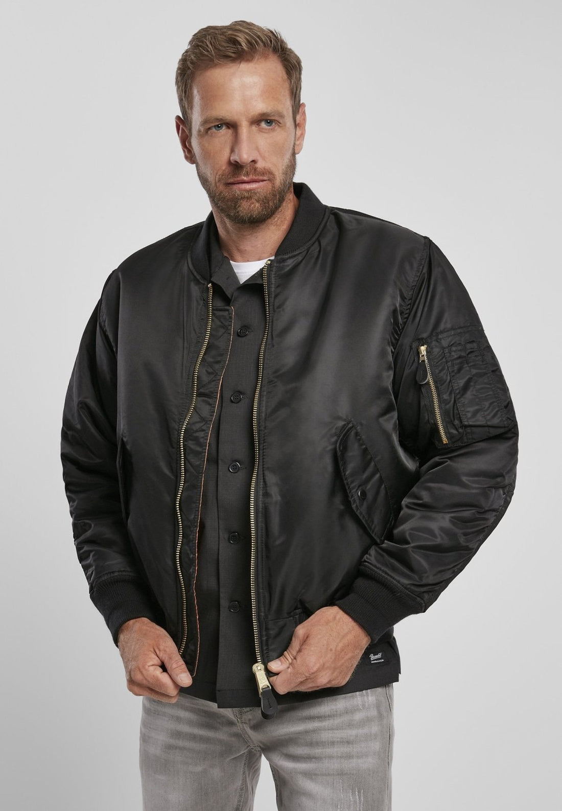 Callisto MA1 bomber jacket in navy, featuring a classic military-inspired design with ribbed cuffs and front zipper closure.