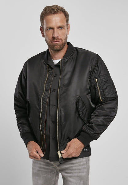 Callisto MA1 bomber jacket in navy, featuring a classic military-inspired design with ribbed cuffs and front zipper closure.