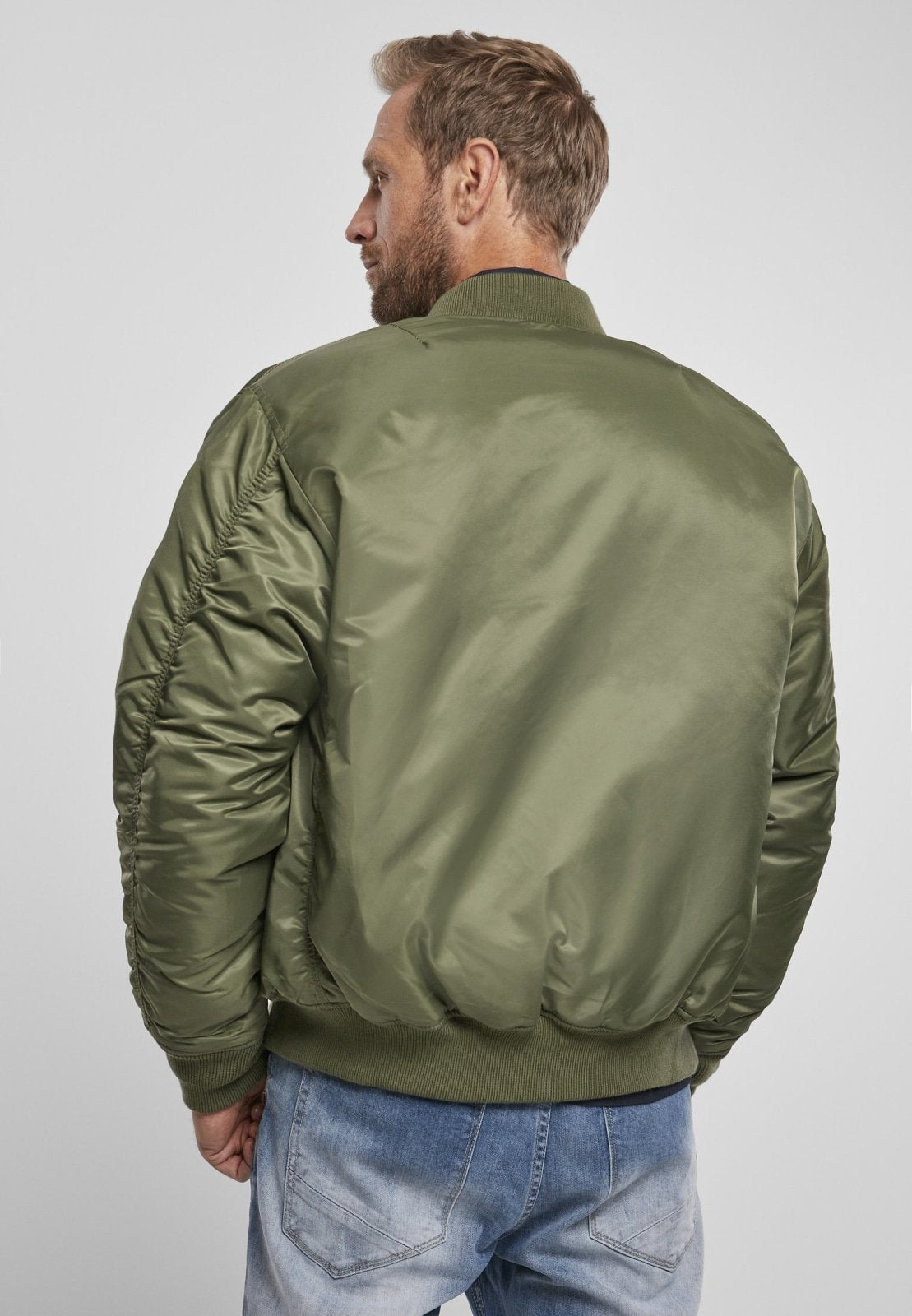 Callisto MA1 bomber jacket in navy, featuring ribbed cuffs and collar, front zipper, and utility pockets, casual outerwear for men