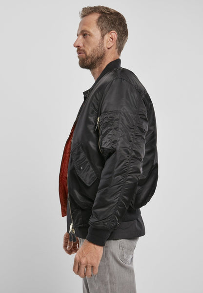 Callisto MA1 bomber jacket in olive green, featuring ribbed cuffs and collar, front zipper, and multiple pockets.