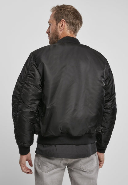 Callisto MA1 bomber jacket with a classic military style, featuring a zipped front, ribbed cuffs, and a versatile design.