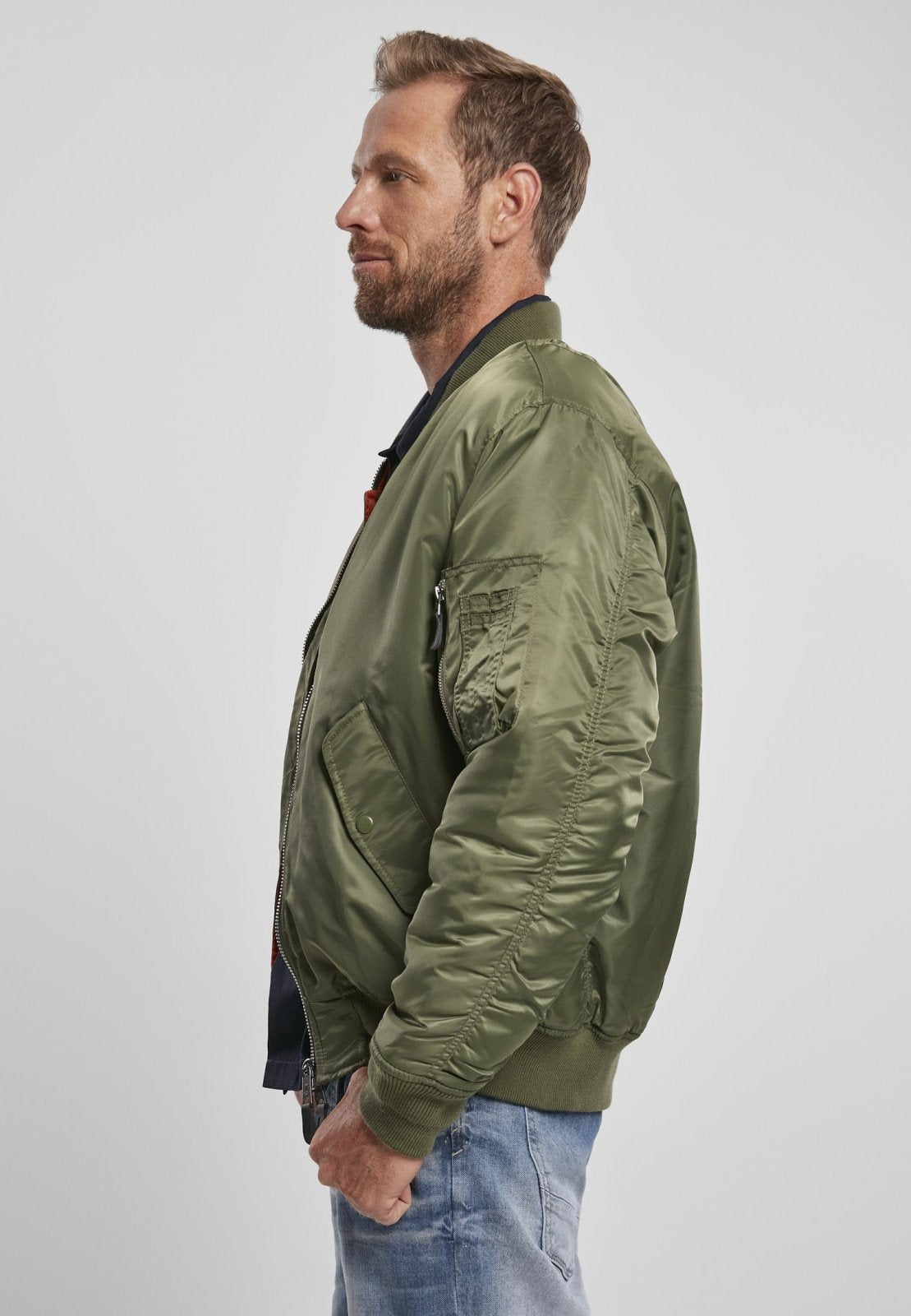 Callisto MA1 bomber jacket in olive green, featuring ribbed cuffs and collar, front zipper, and multiple pockets.