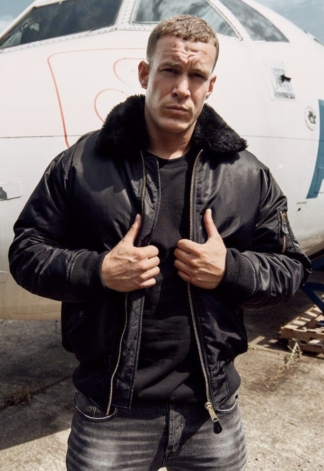 All-black Callisto MA2 fur collar bomber jacket with front zipper and ribbed cuffs, stylish outerwear for cold weather.