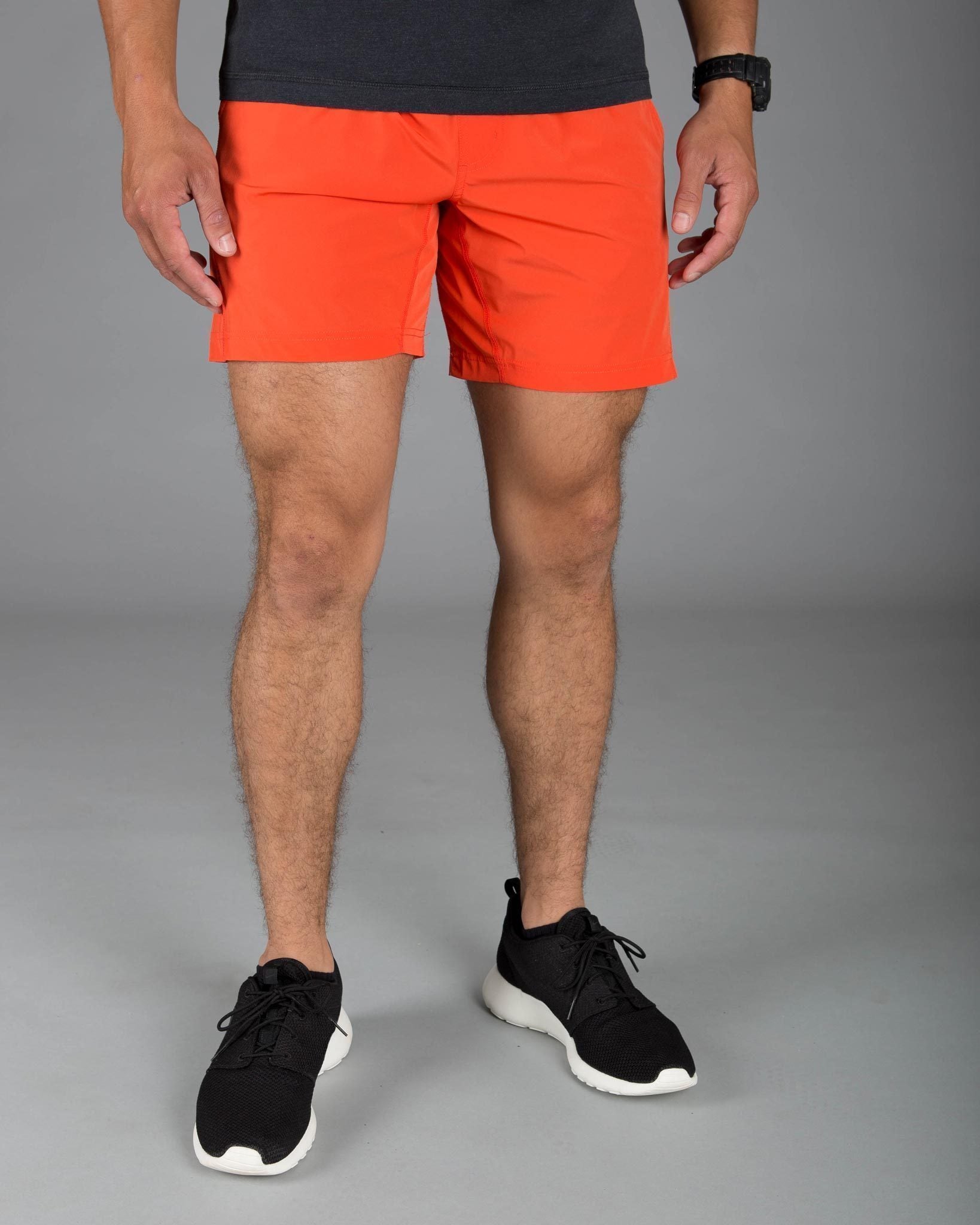 Sky Felix Mako Orange Shorts T-shirt featuring bright orange fabric and casual fit, displayed on a plain background.