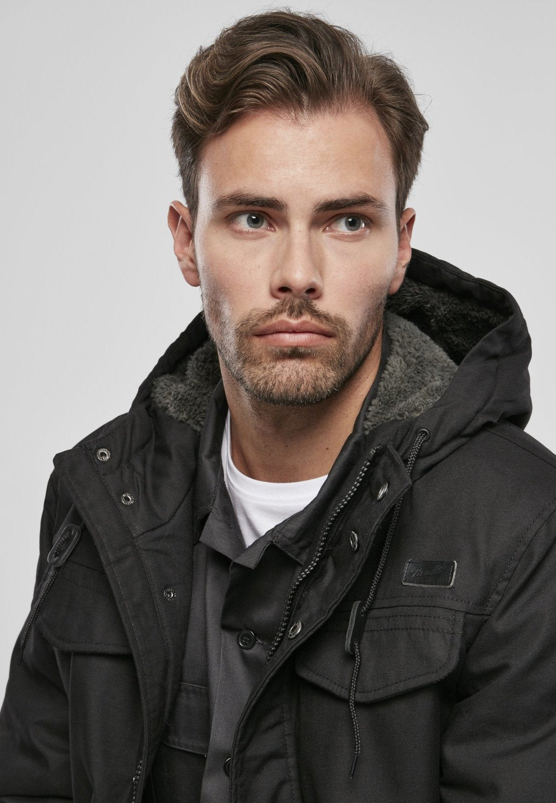Callisto Marsh Lake Parka jacket with hood, heavy insulated coat, in a natural outdoor setting, showcasing its durable design.