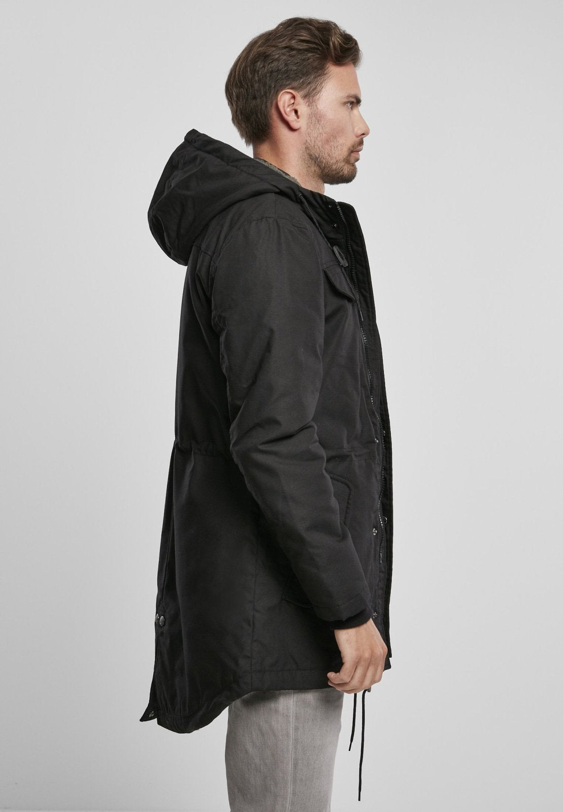 Callisto Marsh Lake Parka jacket shown with heavy insulation and hood, designed for cold weather outdoor wear.