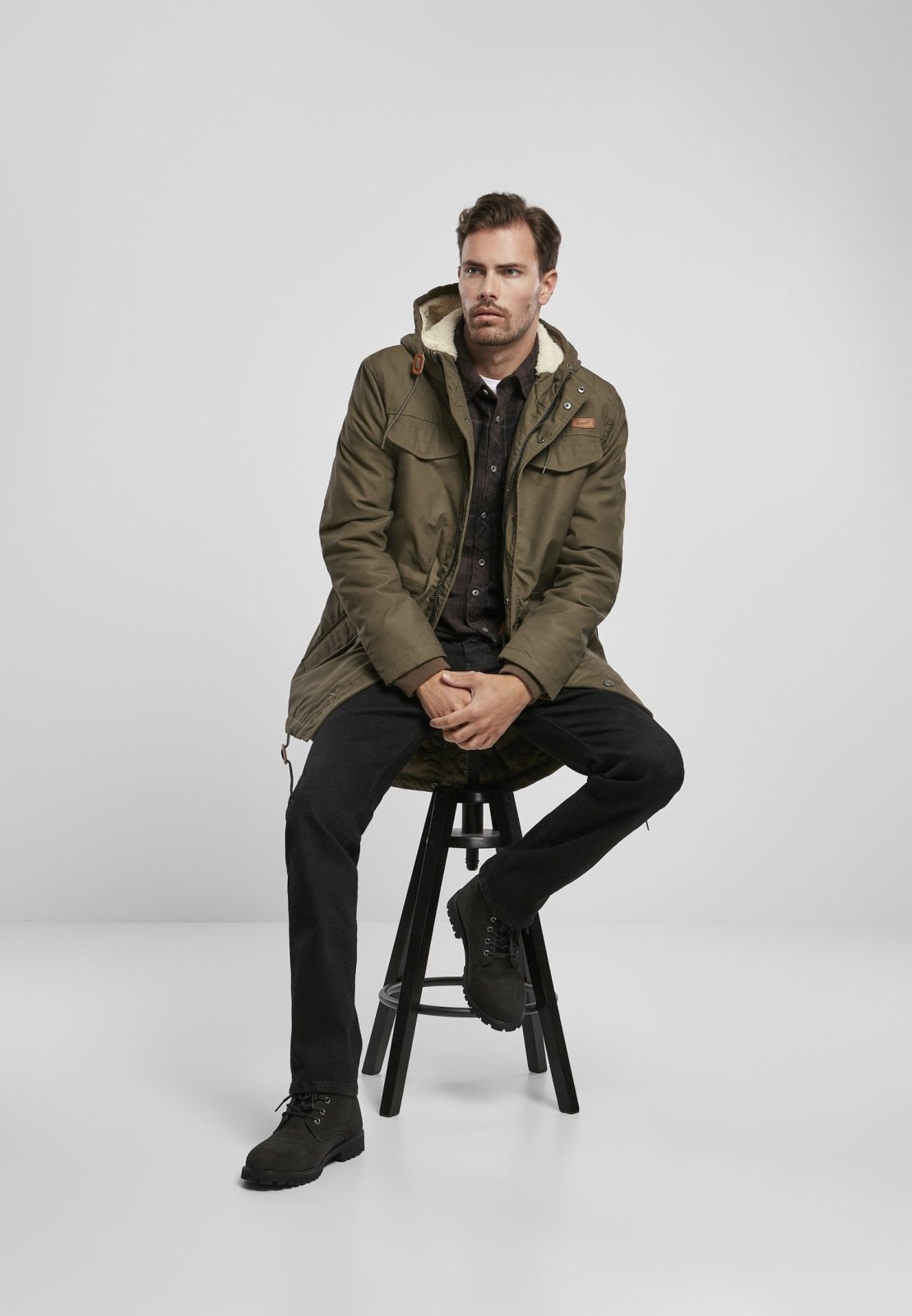 Callisto Marsh Lake Parka Jacket, a heavy winter coat with a hood, designed for warmth and outdoor wear, shown in the image.
