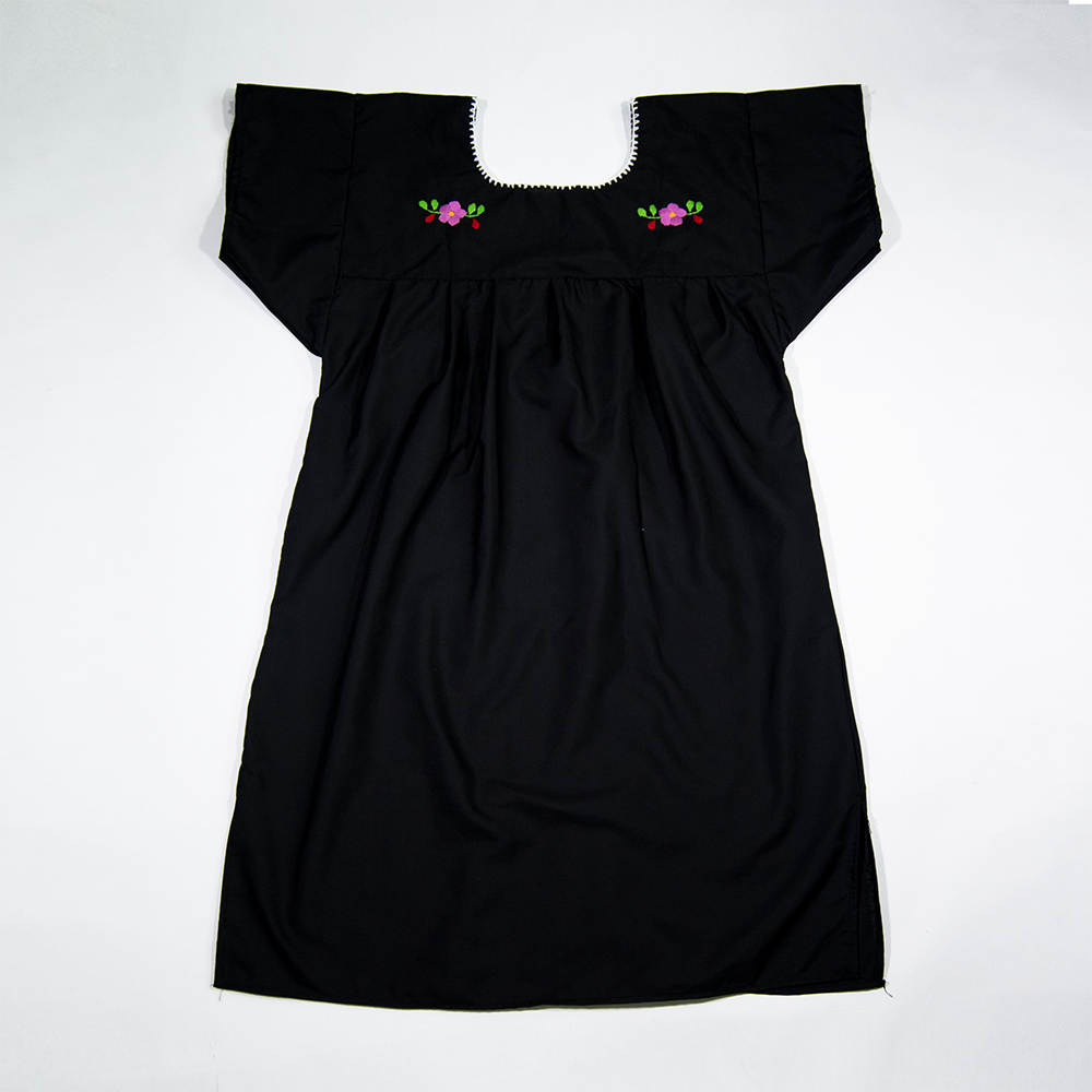 Black Mexican dress by Violet Athena with multicolored floral patterns, featuring traditional woven fabric and vibrant floral accents.