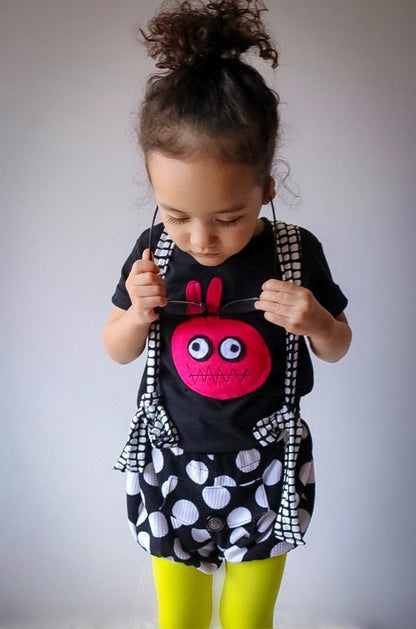 Kids T-shirt featuring a bunny monster by Sky Blue Milo for kids and babies, with colorful bunny and monster design.