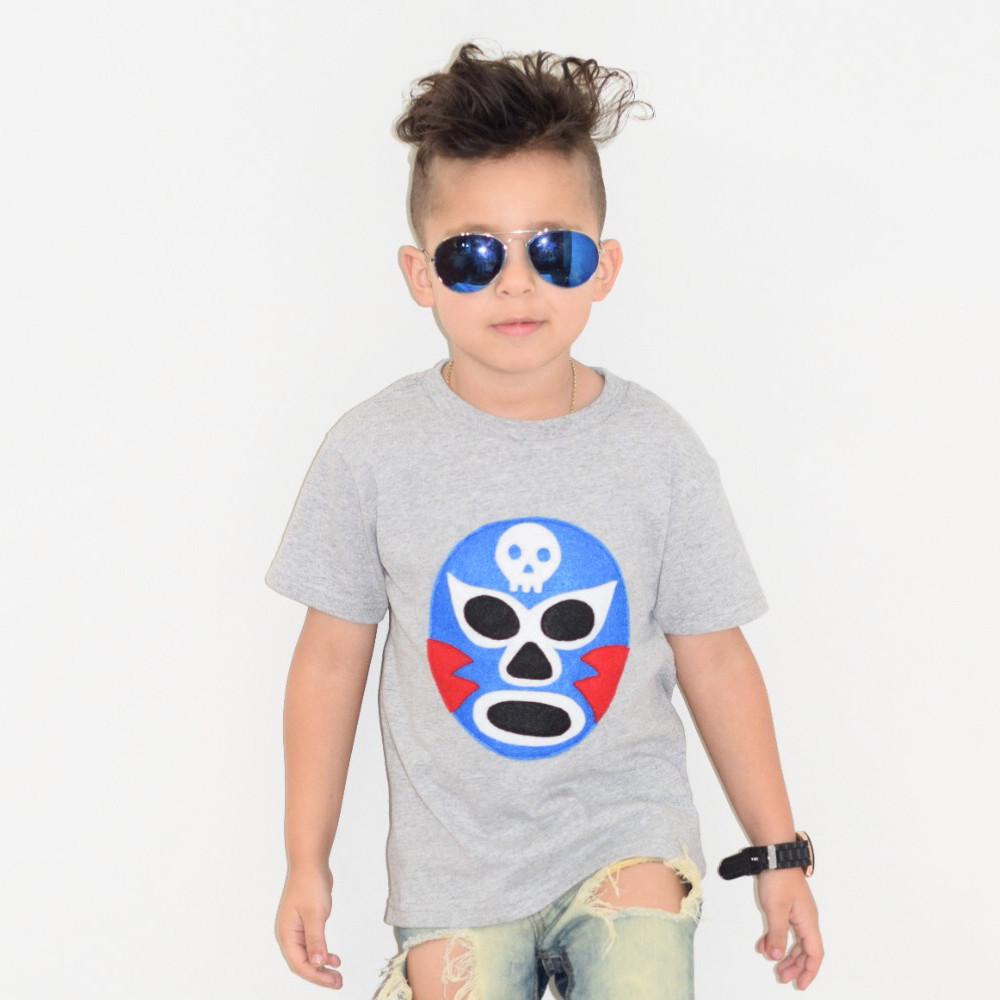 Kids Sky Blue Milo Luchador T-shirt featuring a colorful luchador design on soft cotton fabric.