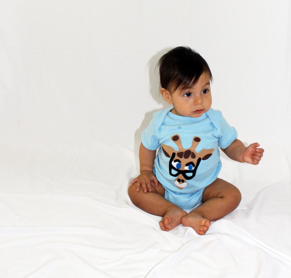 Sky Blue Milo baby onesie featuring Mitford design by Donald Robertson, made for kids and babies, shown in the image.