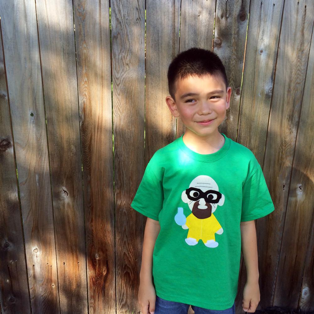 Kids T-shirt by Sky Blue Milo featuring a playful "Let&