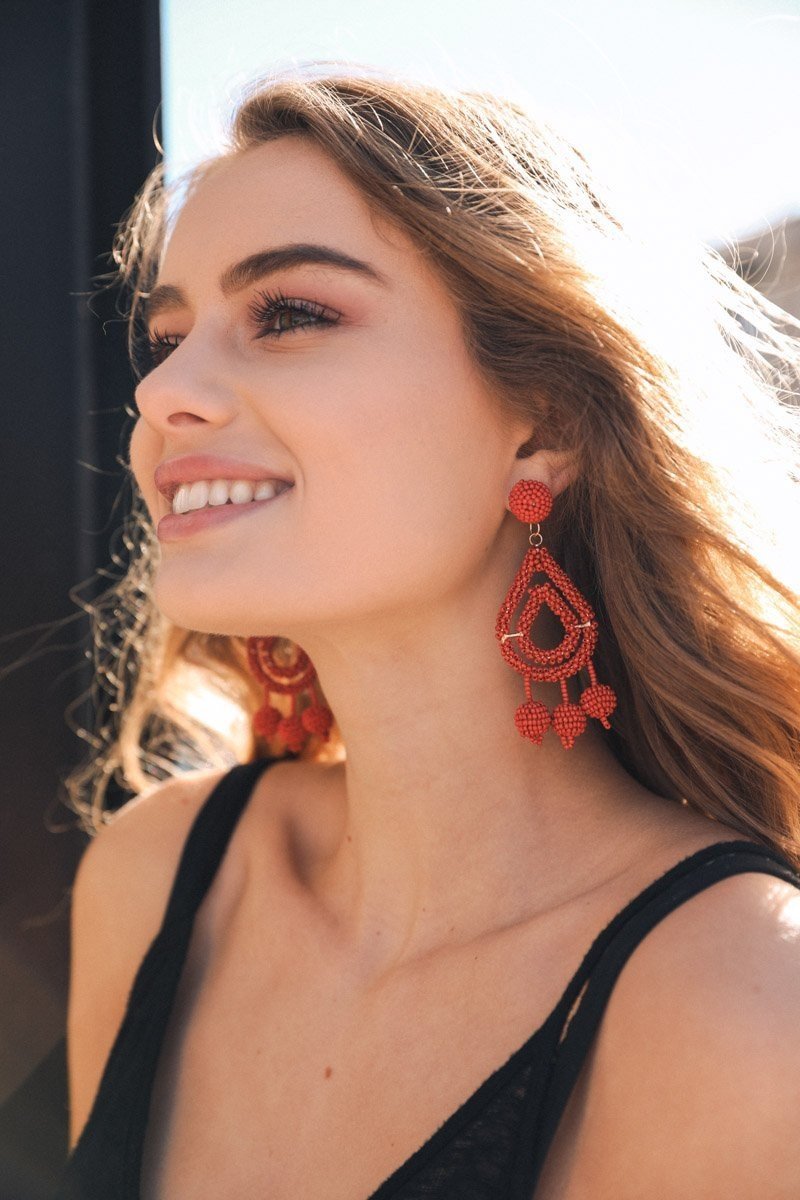 Red micro bead dangle earrings from Periwinkle Aether, featuring delicate, colorful bead design with a stylish dangling look.