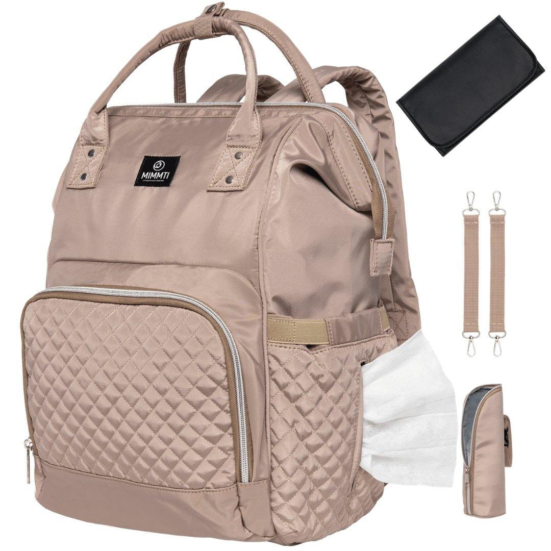 MIMMTI® Luiertas Rugzak 1.0 by Ochre Athena, stylish diaper bag with multiple compartments, displayed in a natural setting.