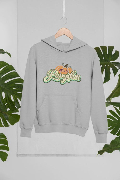 Hello Pumpkin Hoodie by Jade Thalassa, tropical setting mockup of a cozy pullover hoodie featuring pumpkin graphic design.