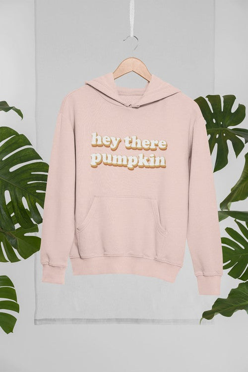 Jade Thalassa Hey There Pumpkin hoodie in a tropical setting, featuring a hanged pullover hoodie with pumpkin-themed design.