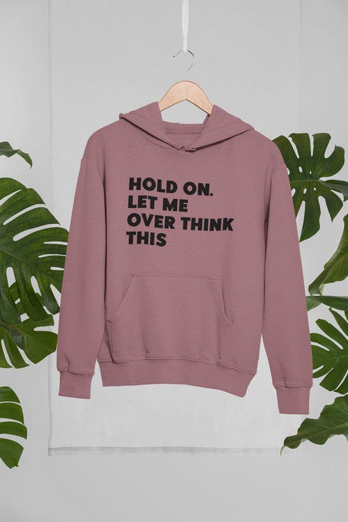 Jade Thalassa "Hold On Let Me Overthink This" hoodie, tropical mockup showing a pullover hoodie with text design in a lush setting.