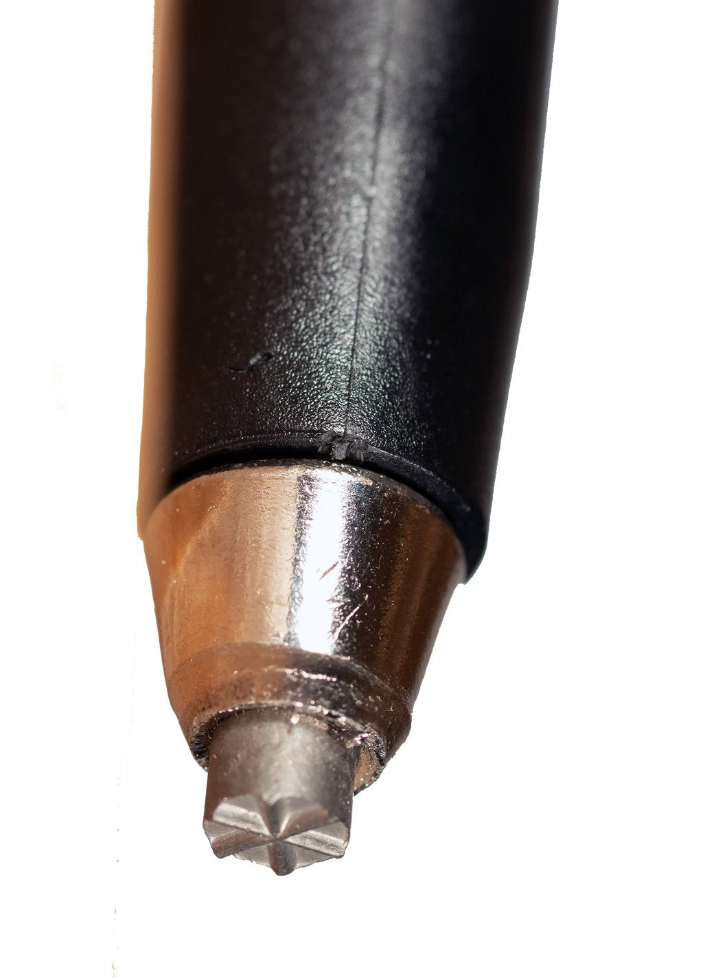Triangulum trekking poles with universal carbide tips for hiking, shown in a close-up image of the tips on camping trekking and hiking poles.