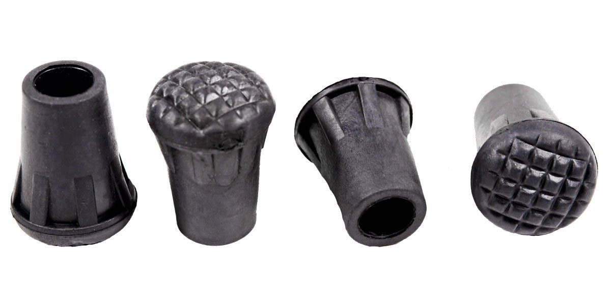 Set of four Triangulum trekking poles rubber tips for camping and hiking, shown attached to trekking pole ends.