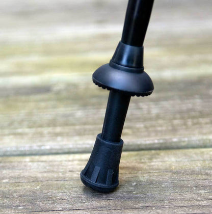 Triangulum trekking poles rubber tips in a 4-pack, designed for camping and hiking with a compact basket and durable rubber material.