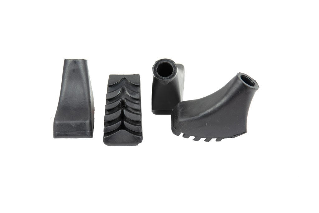Set of four Triangulum Nordic Walking Poles rubber tips for camping and hiking trekking poles, shown with walking boots.