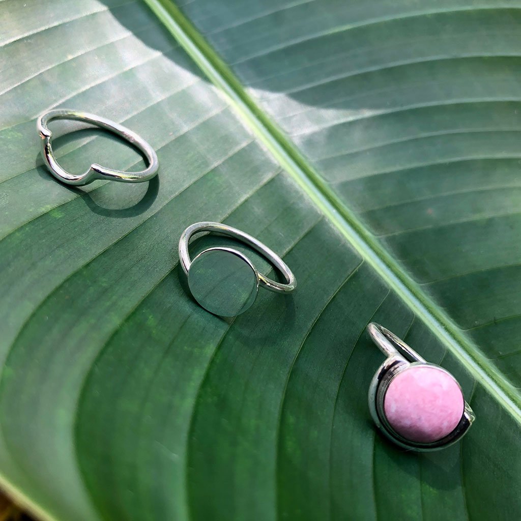 Ariel half moon ring featuring a sleek silver band with a crescent moon design, perfect for elegant jewelry collection.