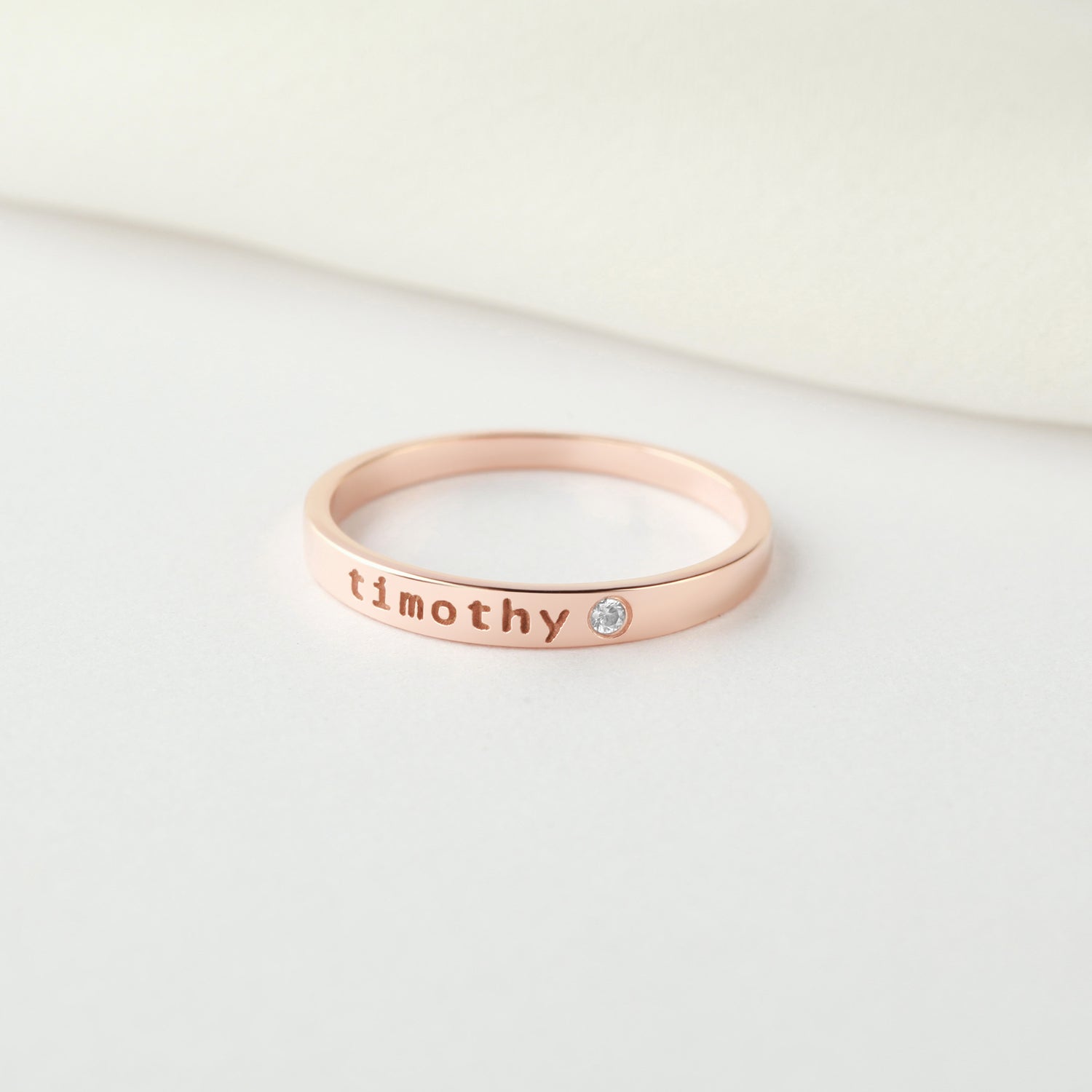 Green Millie personalized name ring with embedded birthstone, stackable mom ring featuring custom engraved name.