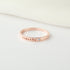 Green Millie personalized name ring with embedded birthstone, stackable mom ring featuring custom engraved name.