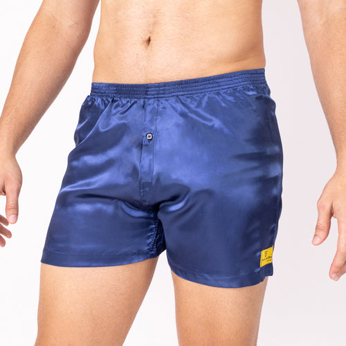 Navy satin boxer shorts for men by Crimson Daisy, featuring a smooth, shiny fabric and relaxed fit for comfortable wear.