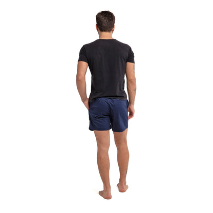 Ruby Tartarus navy cotton swim shorts with a relaxed fit and elastic waistband, suitable for casual summer wear.