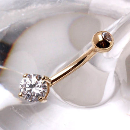 14K gold navel ring with prong-set round cubic zirconia, stylish jewelry by Peridot, shown in close-up image