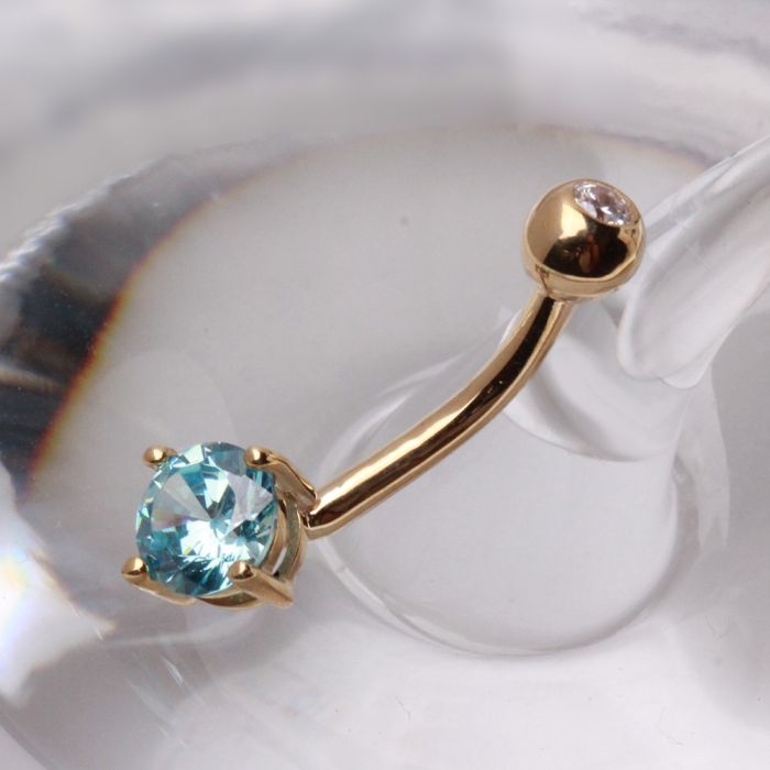 14K gold navel ring with prong set round cubic zirconia, jewelry and watches by Peridot, showing the detailed design.