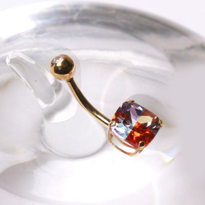 14K yellow gold navel ring with a miracle cubic zirconia, stylish jewelry piece from Peridot.