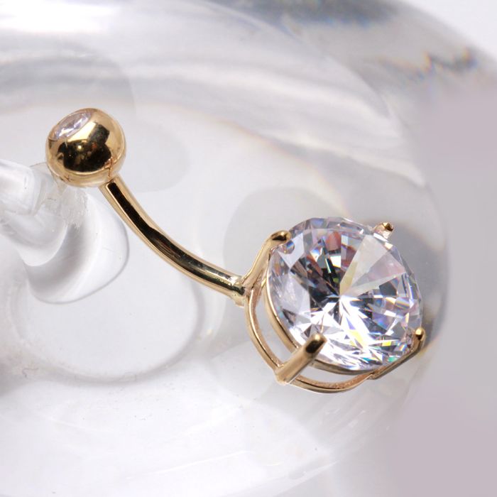 14K yellow gold navel ring with a large clear round CZ gemstone, prong set, from Peridot jewelry collection.