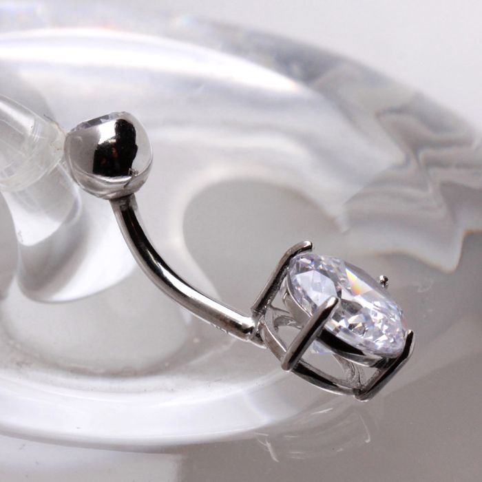 14Kt white gold navel ring with prong set cubic zirconia by Peridot, featuring a sleek and sparkling jewelry design.