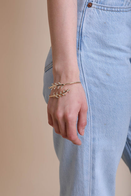 Gold olive leaf bangle bracelet from Periwinkle Aether&
