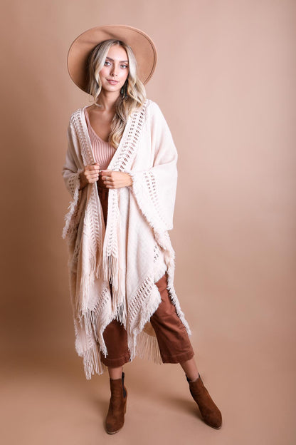 Open work frayed bohemian ruana from Periwinkle Aether, lightweight accessories with a relaxed, fringed design perfect for layering.