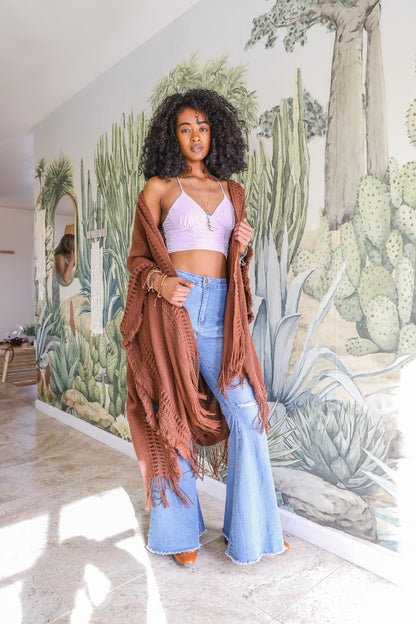 Open Work Frayed Bohemian Ruana from Periwinkle Aether, lightweight accessory with a relaxed, open-knit design and frayed edges.