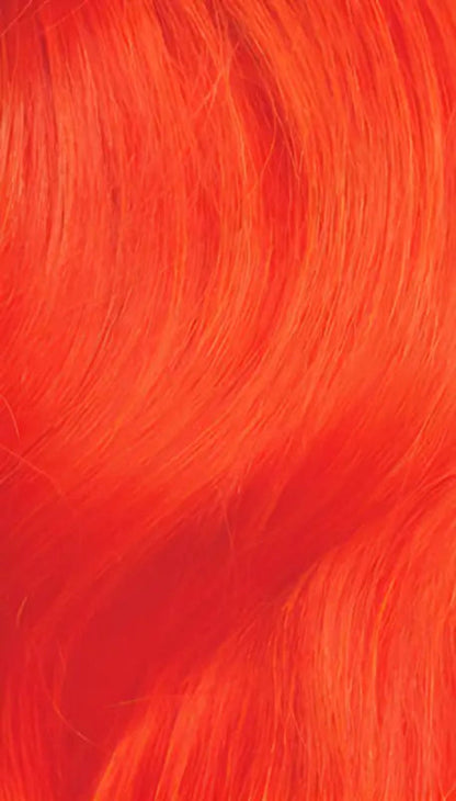 Orange Moni bold Afro Mohawk wig by Peach Clymene featuring kinky curly and afro curly textured hair style.