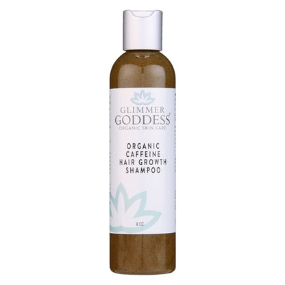 White Thalassa Organic Caffeine Hair Growth Shampoo in a clear bottle, with a green label, suitable for hair strengthening and scalp care.