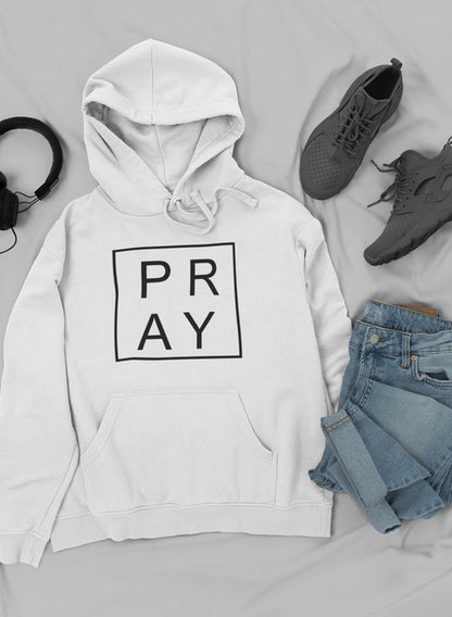 Jade Thalassa Pray Hoodie in casual outfit with trendy sneakers and jeans, displayed as a mockup on a model.