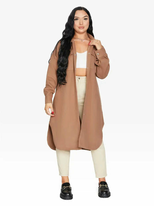 Camel oversized longline shacket by Rose Eleusis, featuring a relaxed fit, button front, and side pockets, ideal for casual layering.