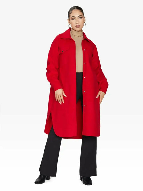 Red oversized longline shacket by Rose Eleusis, featuring a relaxed fit, button closure, and casual jacket style for UK sizes 8-14.