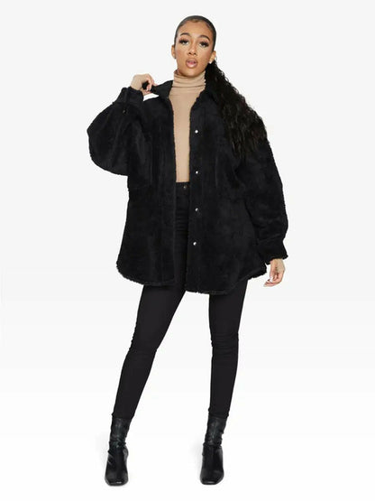Black oversized patch pocket Borg teddy shacket by Rose Eleusis, featuring a cozy, plush texture and relaxed fit for casual wear.