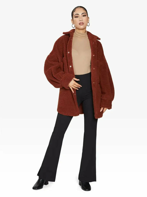 Brown oversized patch pocket Borg teddy shacket by Rose Eleusis, featuring a cozy, plush fleece and relaxed fit for jackets and coats.