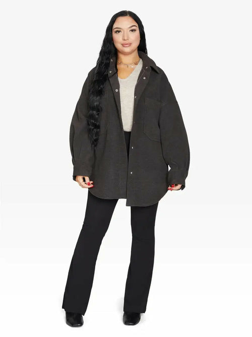 Grey oversized patch pocket shacket by Rose Eleusis, a stylish jacket with large front pockets and relaxed fit for UK sizes 8-14.