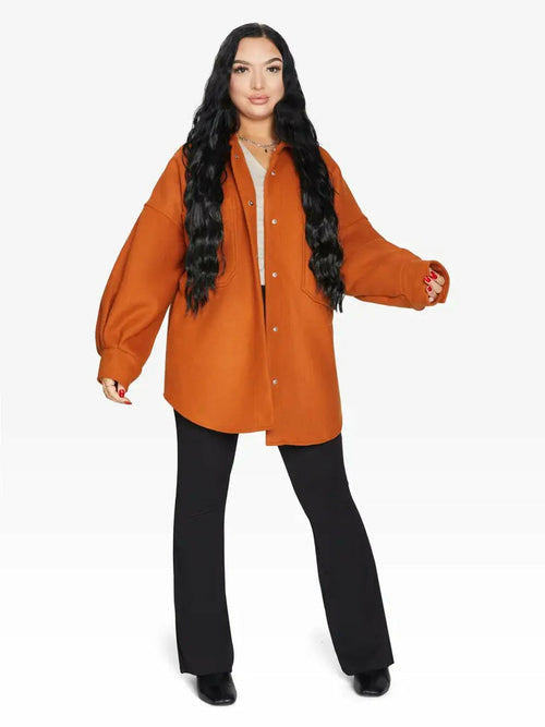 Orange oversized patch pocket shacket by Rose Eleusis, casual jacket with large front pockets, one-size-fits-UK 8-14, stylish and comfortable.