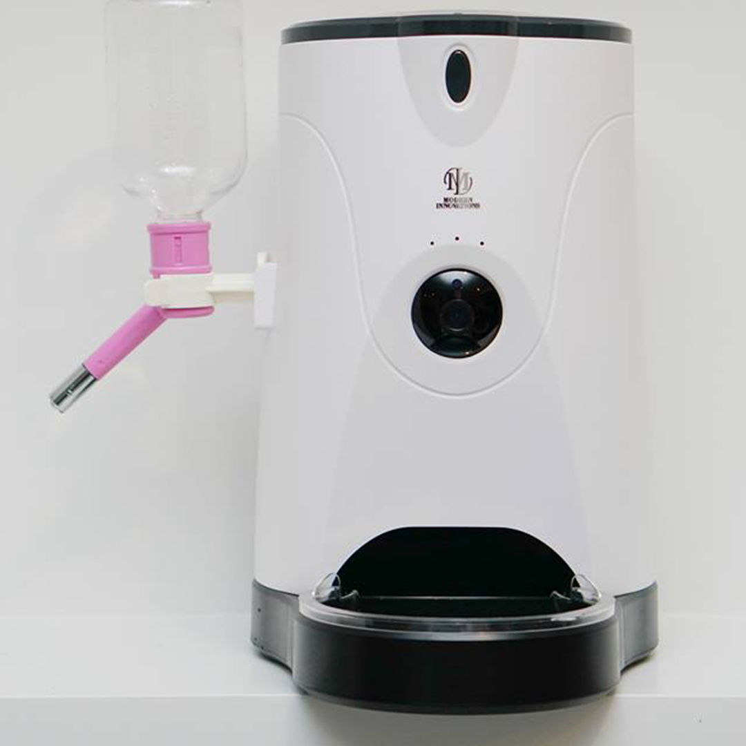 Pink Trillium WiFi pet feeder for petcare, showing a sleek device with food dispensing components and WiFi connectivity.