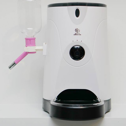 Pink Trillium WiFi pet feeder for petcare, showing a sleek device with food dispensing components and WiFi connectivity.