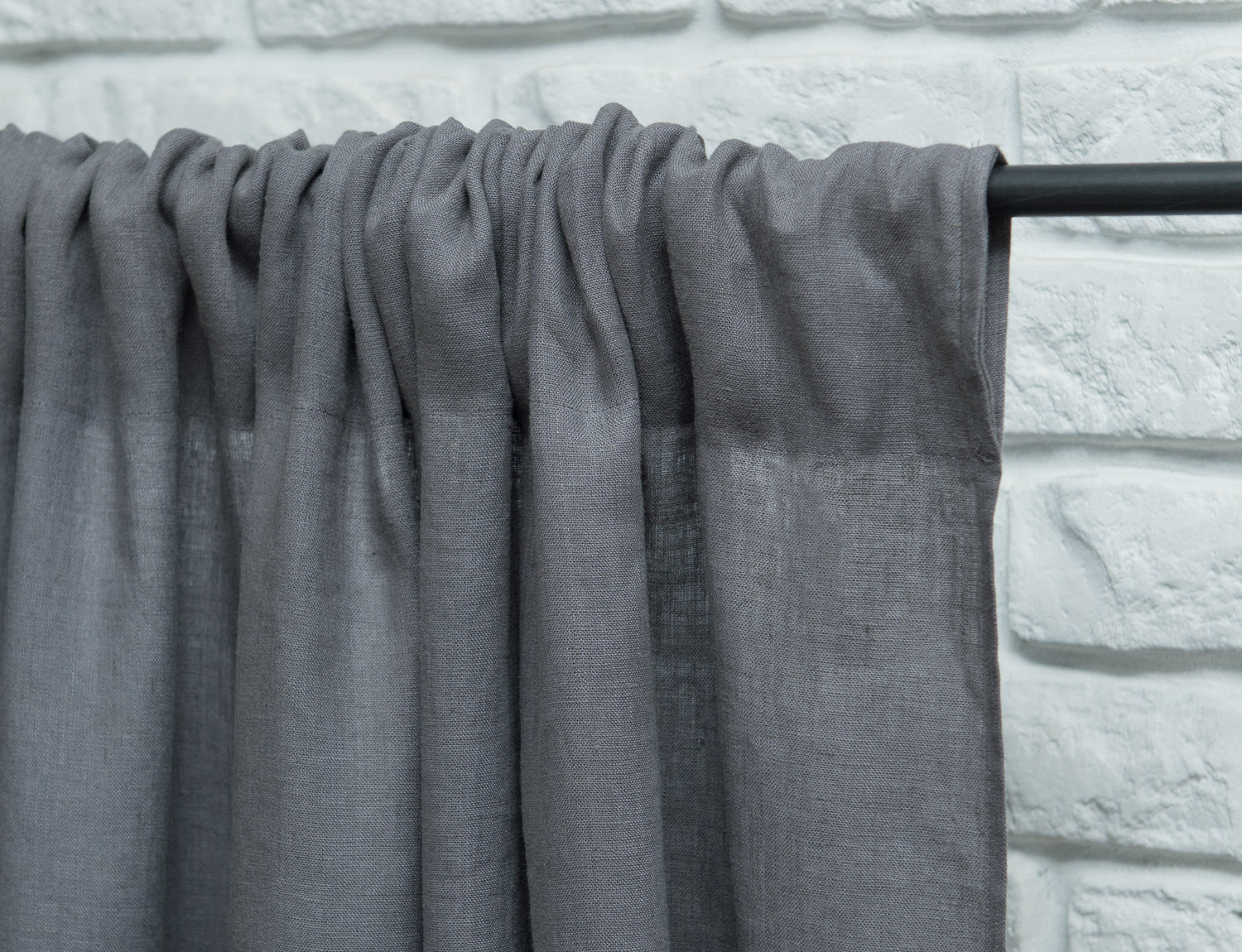 Grey linen curtain with rod pocket from Magenta Sugarplum, decorative home decor with elegant, textured fabric and rod pocket design.